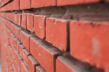 red brick wall in perspective. selective focus