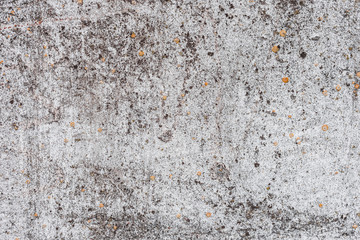 Wall fragment with scratches and cracks