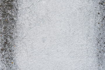 Wall fragment with scratches and cracks