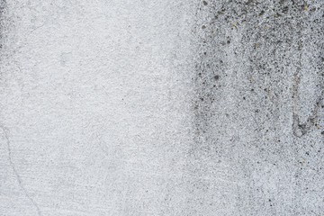 Wall fragment with scratches and cracks