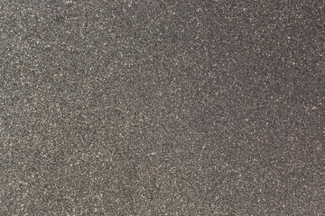 Schwarzer glitzernder Hintergrund