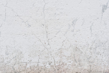 Wall fragment with scratches and cracks