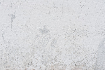 Wall fragment with scratches and cracks