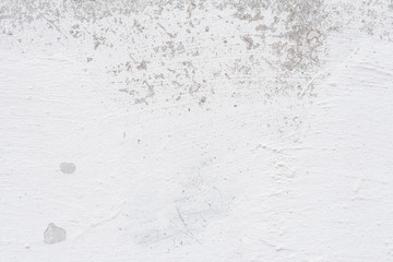 Wall fragment with scratches and cracks