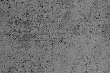 Wall fragment with scratches and cracks