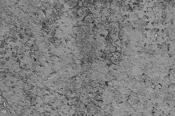Wall fragment with scratches and cracks