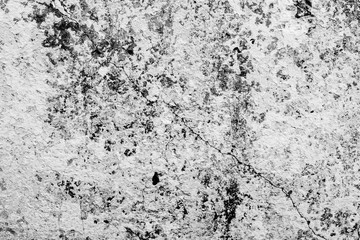 Wall fragment with scratches and cracks
