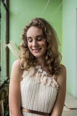 Portrait of a girl with a white-toothed smile.