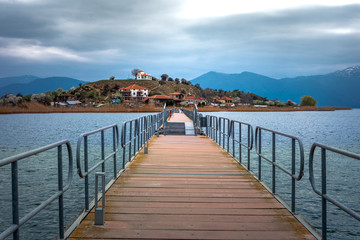 The islet of Agios Achilios in small Prespa lake, Greece