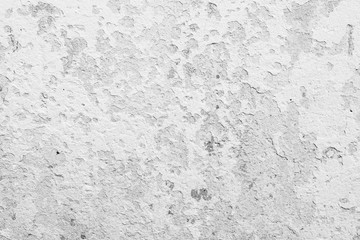 Wall fragment with scratches and cracks