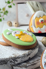 Tasty beautiful easter gingerbread cookies on a white wooden surface. Holiday bright Easter. Preparing for a religious holiday.