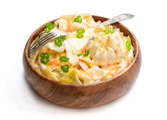 Homemade marinated cabbage with garlic isolated on a white