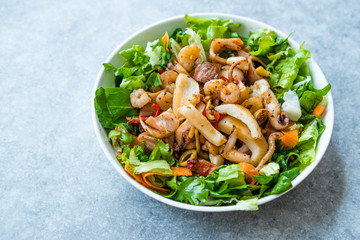 Mix of Seafood Salad with Calamari, Shrimp and Octopus.