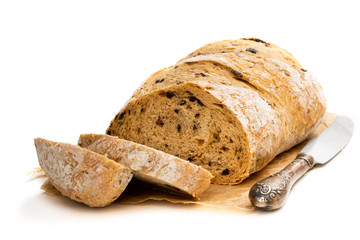 Homemade rye loaf bread with olives isolated on white