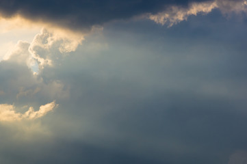 Obraz premium Landscape with dramatic light - beautiful golden sunset with saturated sky and clouds.