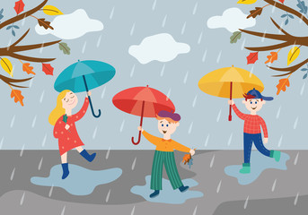Cheerful children playing under umbrella in rainy weather outdoors in autumn park or garden.