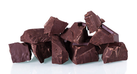 Pieces of bitter dark chocolate isolated on white