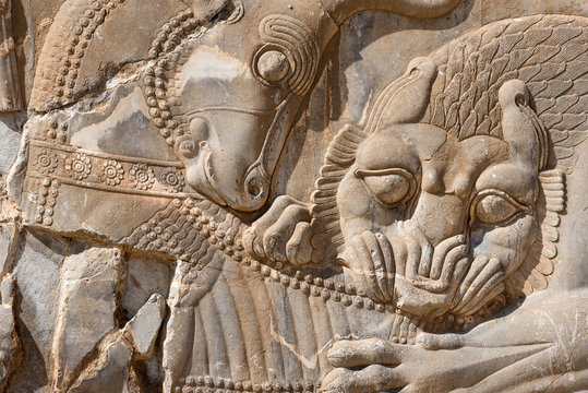 Relief in stone wall of ancient temple