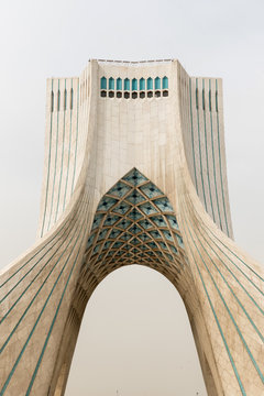 Modern tower and cloudy sky