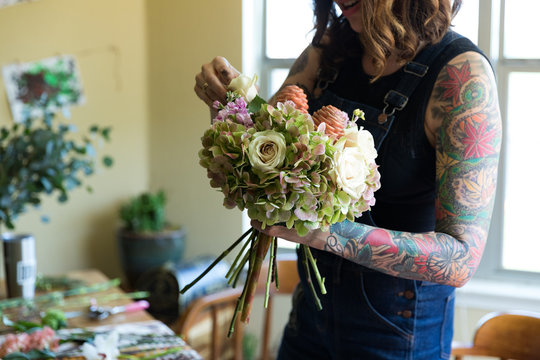 Floral Designer working on arrangement