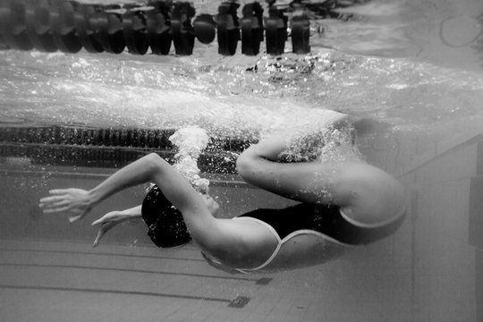 Underwater professional swimmer.