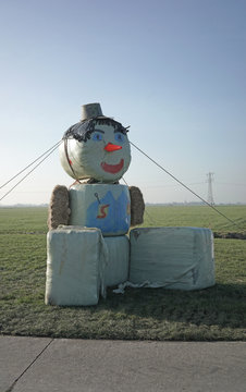 Giant figure made of haybales, to celebrate a farmers 50th birthday