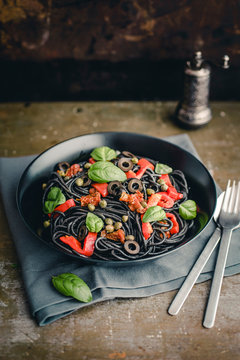 Food: Spaghetti sepia with dried tomato, grilled bell pepper