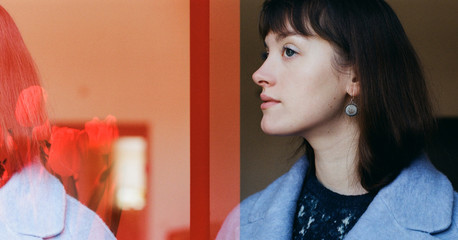 Double exposure film portrait of a woman