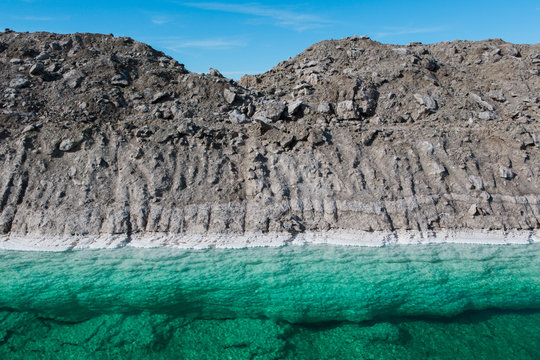 Calcium chloride mine tailings and canal in desert