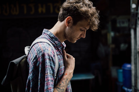 Portrait of young skater in the city