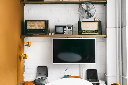 Retro Radios on Shelves in Bright Conference Room