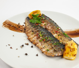 grilled salmon steak with vegetables and sauce