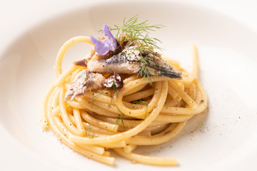 Italian pasta with sardienes, close up