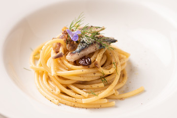 Italian pasta with sardienes, close up