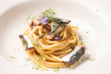 Italian pasta with sardienes, close up