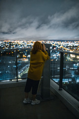 Girl looking to the city 3