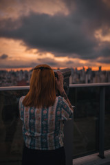 Girl looking to the city 2