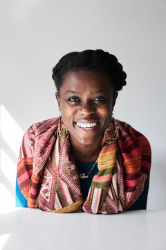 Portrait of black african woman laughing.