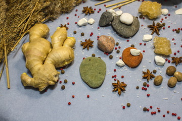 composition with spices. Ginger, anise, pebbles, pink pepper
