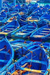 Typical blue boats in the harbor of Essaouira, Morocco