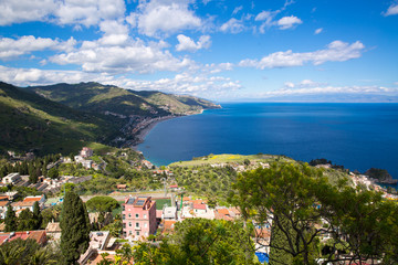 Fototapeta premium Bright blue Ionian sea (Mediterranean sea), sunshine landscape of Taornima coastline, Sicily island, Italy. 