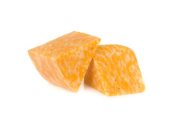 Marble cheese on a white background. Two triangles of cheese close up.