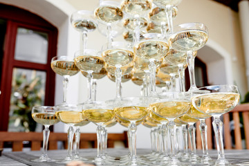 glasses of champagne on the table outside