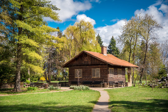 Wooden house near a forest. The park of Vrana Palace in Sofia, Bulgaria