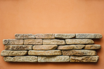 Natural stone in the wall. Texture. Copy space