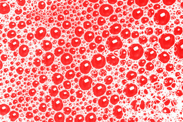 Red foam bubble texture. Abstract water washing suds pattern background.