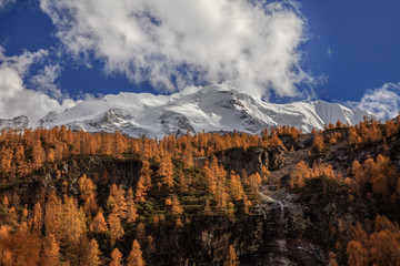 Yala Snow Mountain towering in the distance. Tibetan area of Sichuan Province China, Valley covered...