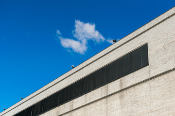 Windowless exterior wall of a tall commercial building in New York City, NY, USA
