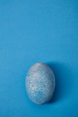 Easter egg on a blue background