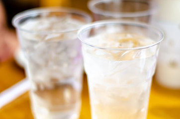 Plastic tumblers of water